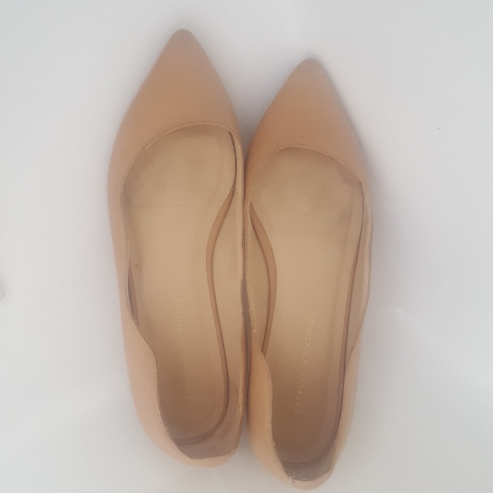 Blush colored designer flats